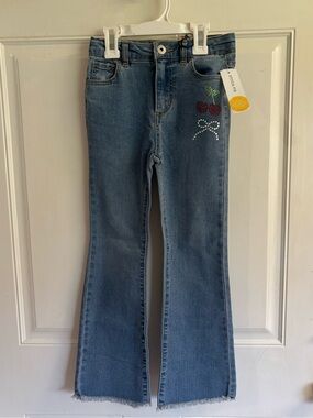NWT size 6 Wild Daisy by Zunie mid rise flare rhinestone fray hem jeans RT 34